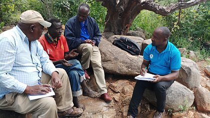Mr. Marealle, Mr. Selemani and Dr. Anney interview a traditional healer 